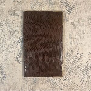 Smythson Antique lizard skin passport wallet with gold corners